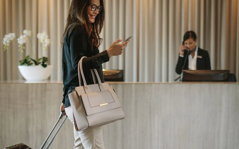 women at hotel reception